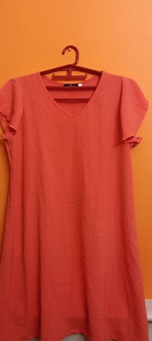 Vestido salmão com manga caída