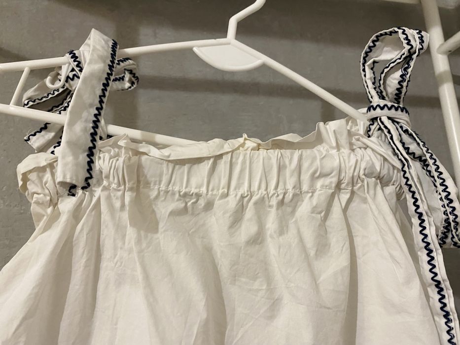 Biała bluzka z kokardkami