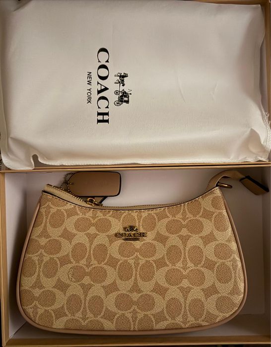 Mala Coach com caixa original