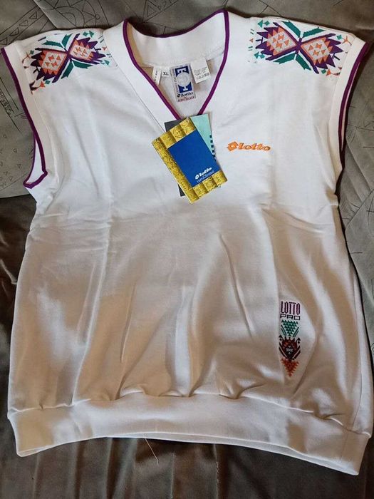 Мужской джемпер-безрукавка фирмы "Lotto". Новый.