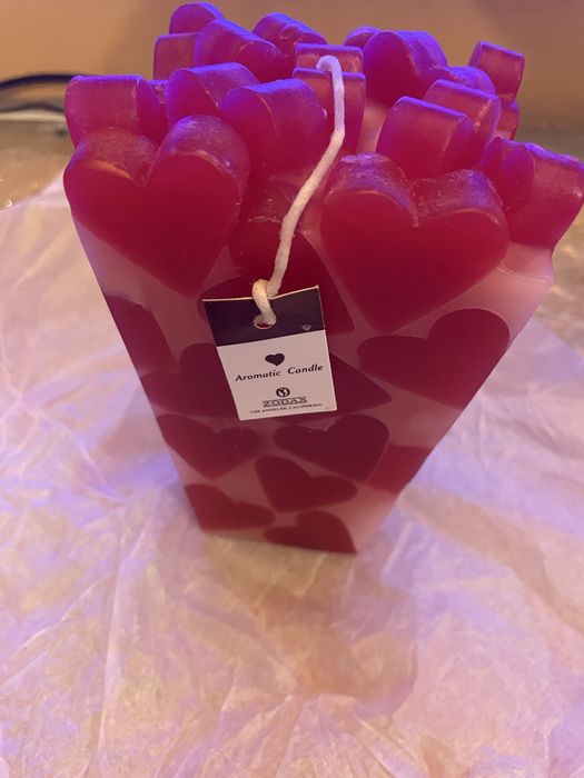 Velas novas pergumadas com  corações muito bonitas