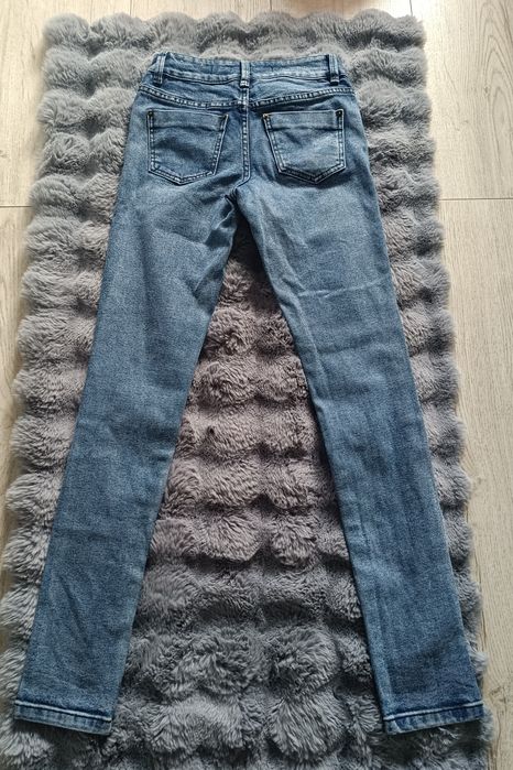 Damskie spodnie jeansowe jeansy