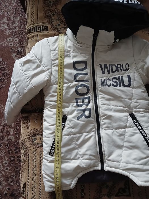 Зимова  куртка на дівчинку 110- 118 см