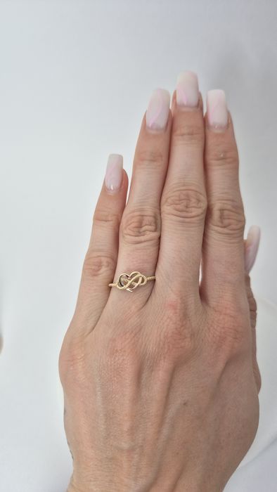 Nowy złoty pierścionek serce znak nieskończoności przeplatany delikatn