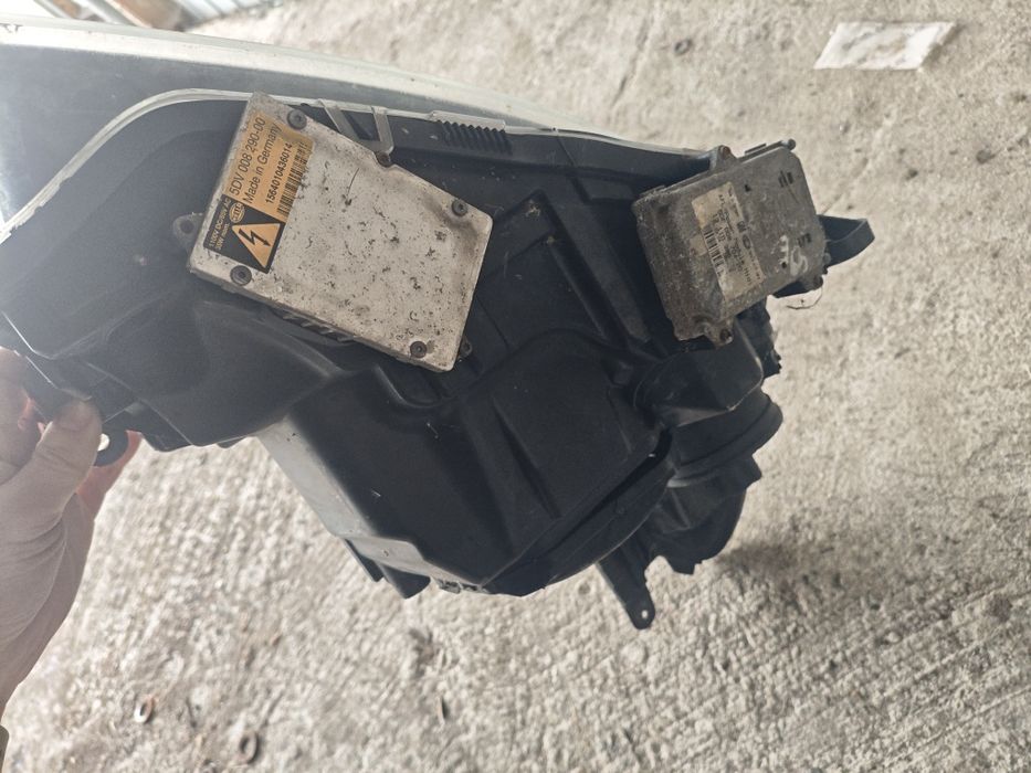 Reflektor Xenon lewa opel astra h