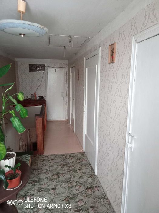 Двоповерховий будинок (половина) Нові Петрівці