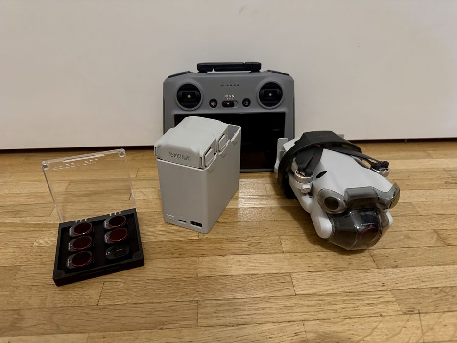 REZERWACJA - Dron DJI Mini 4 Pro Fly More Combo + filtry ND - Jak nowy