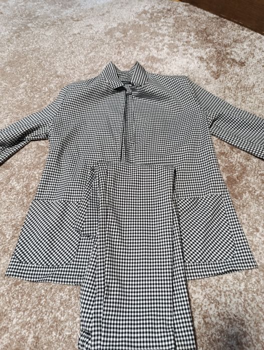 Жіночий костюм..