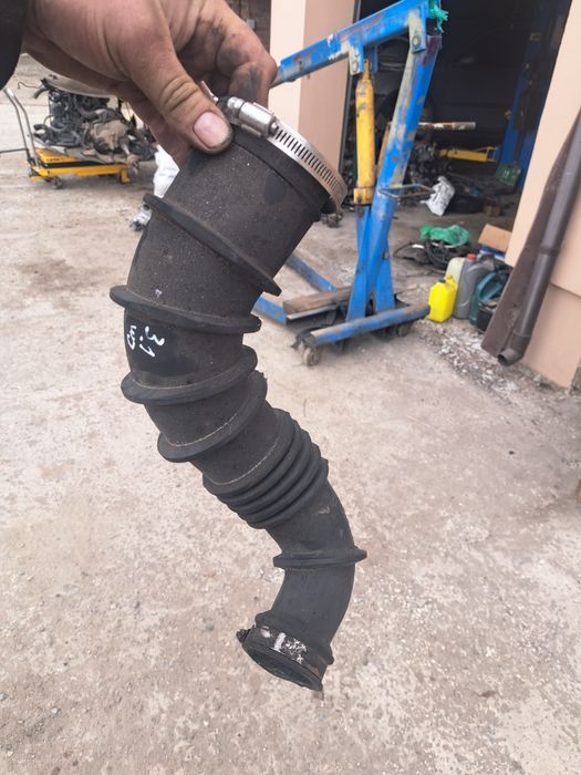 Патрубок повітряний Jeep Grand Cherokee 3.1td 1999-2004 04854188AB