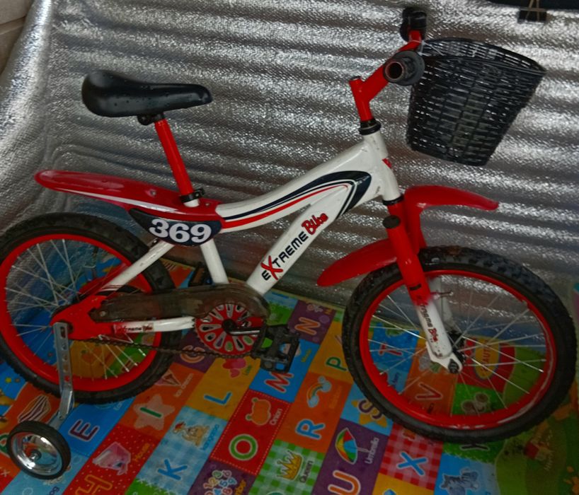 Продам детский велосипед Extreme Bike на 18 дюймов+колесики.