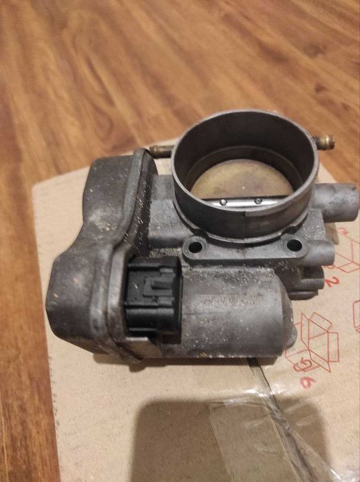 Продам ел. дросельну заслінку на Opel Omega b