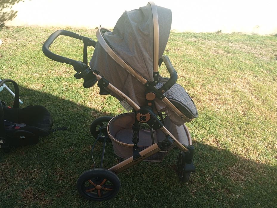 Kit carrinho bebe + trocador com banheira + porta bebe canguru