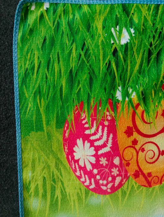 Mały kuchenny ręcznik z motywem świątecznym.