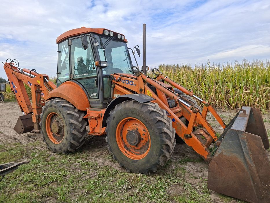 Koparkoładowarka New Holland LB 115. Fiat Hitachi FB200.2