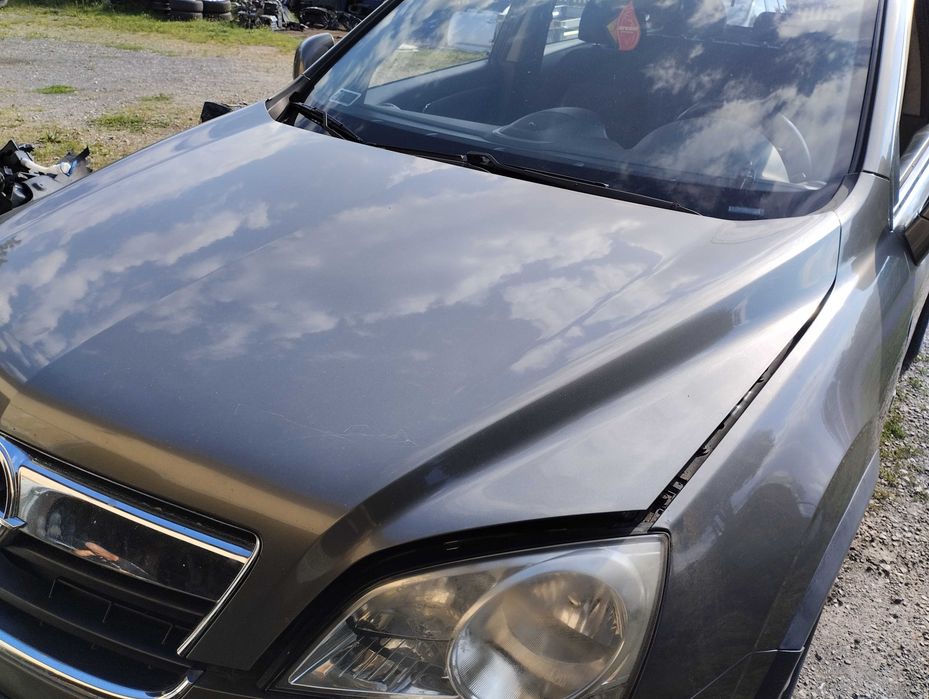 Opel ANTARA Maska z grillem Europa kolor 79U bez malowania LAKIER ORYGINAŁ
