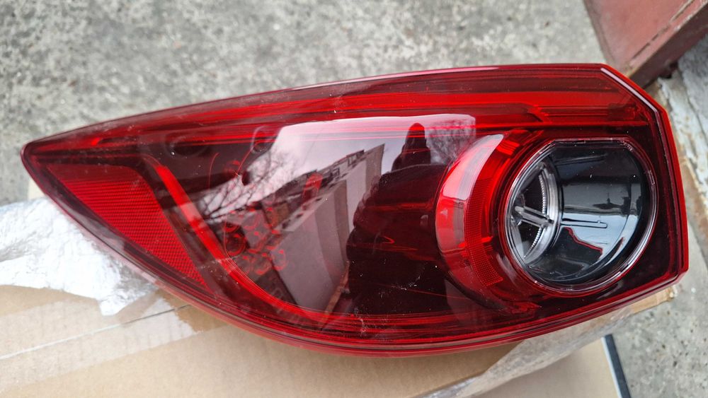 Фонарь Mazda 3 левый наружный