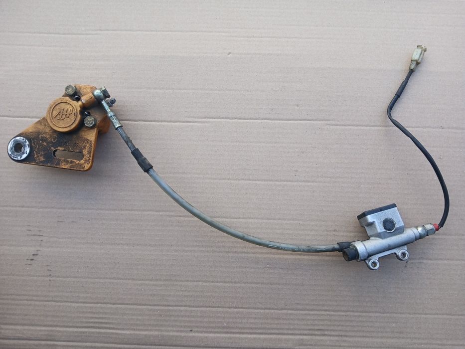 Zacisk Tył  Pompa Czujnik Peugeot XP6 50