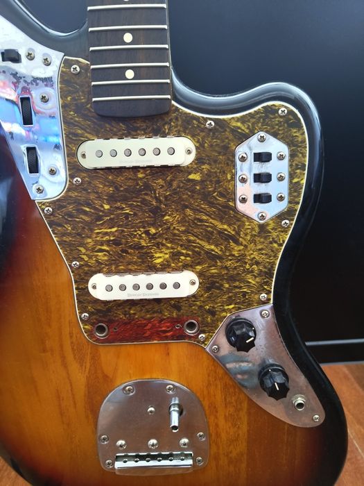 Troco escudo/pickguard Jaguar