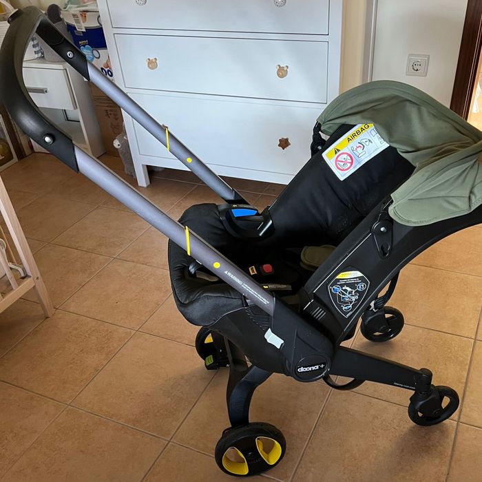 Doona plus 2 em 1 + bag, base isofix