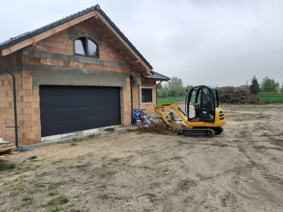 Kompleksowe usługi mini-koparka. Koparka gąsienicowa.