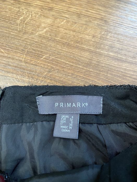 Трендова твідова спідниця