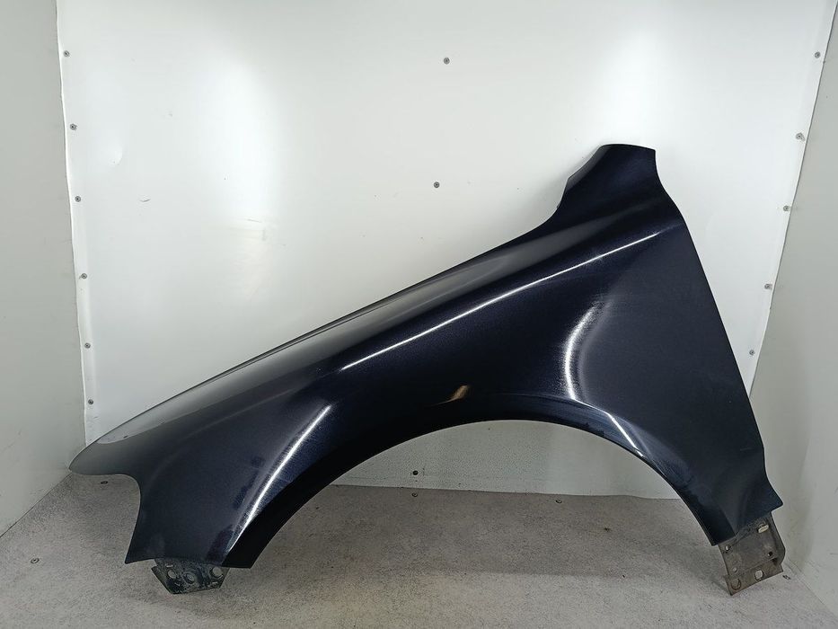 BŁOTNIK LEWY PRZÓD VW TOUAREG I LC9Z