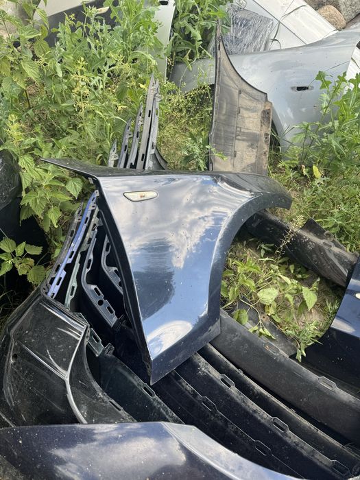 Błotnik lewy przód BMW E87