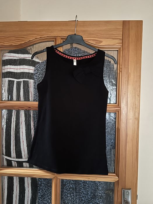 House elastyczny elegancki top bluzka bez rękawów z kokatdą pod żakiet