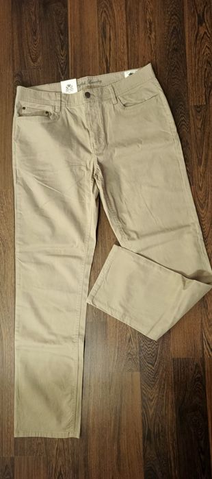 Продам мужские джинсы светло-коричневые новая