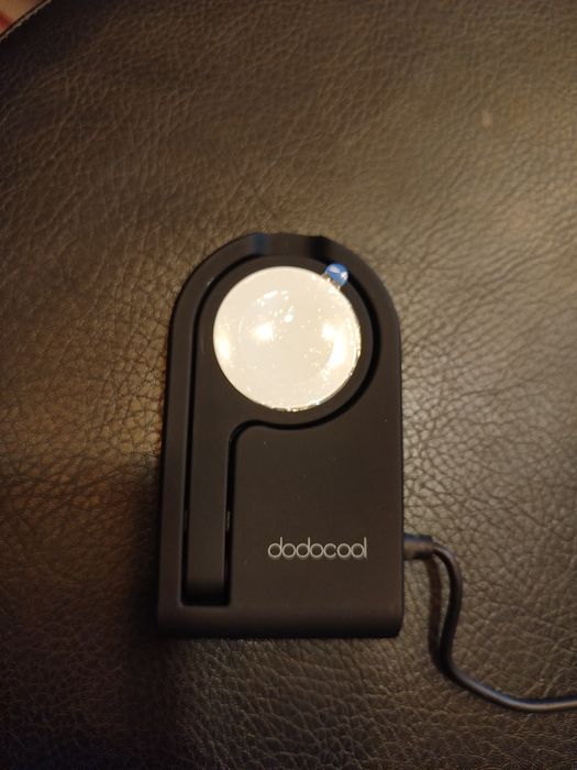 Suporte de carregamento magnético de Apple Watch sem fios.