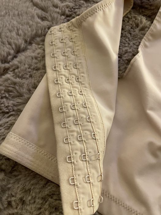 Colete de compressão L