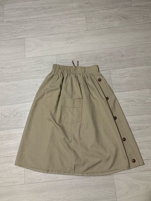 Довга спідниця з кишенями