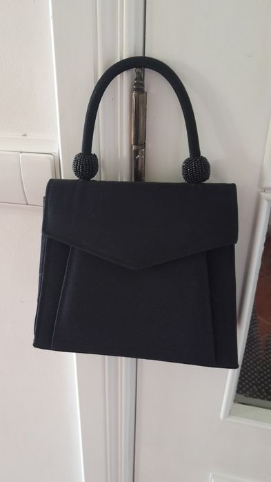 Clutch preta de veludo