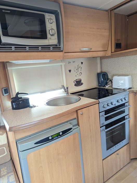 RESERVADA, Caravana/ quarto fixo/4 pessoas/levo ao local