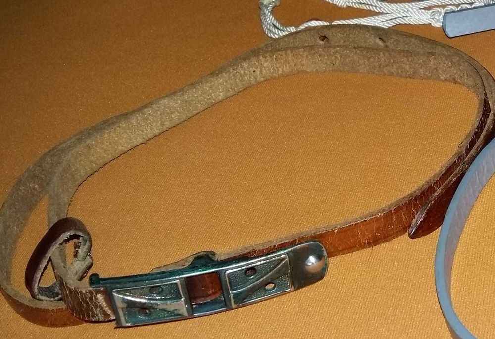 Pasek damski ze skóry licowej,brązowy.Długość 98cm
