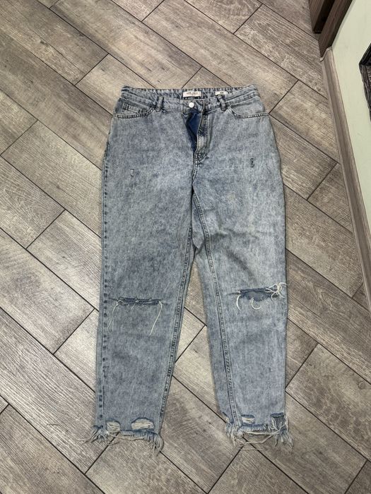 Джинси блакитні, порвані