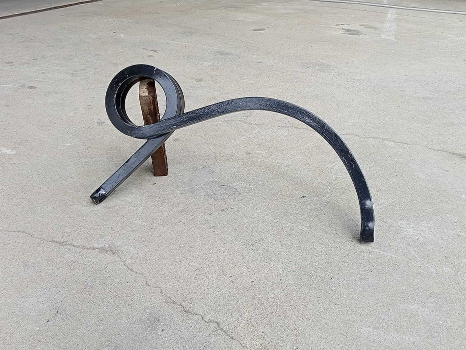 Mola de caracol para escraficador