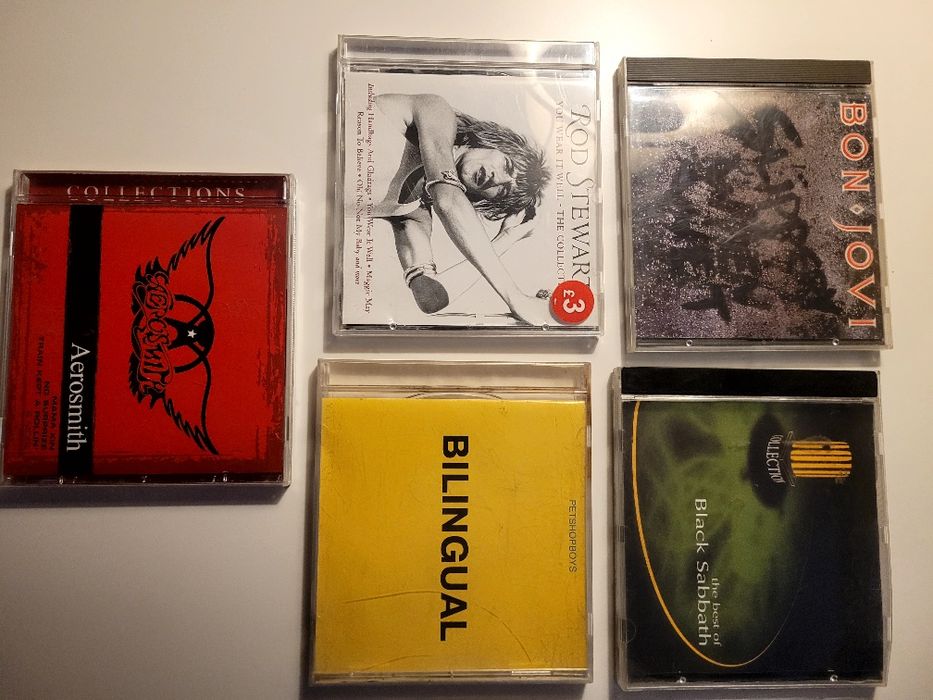 Zestaw pięciu płyt cd rock.