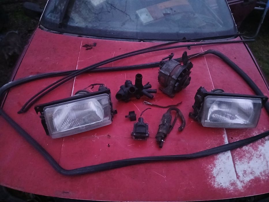 VW Polo 86c 1986 rok, Części.Konsola,lampy,lusterka,gaźnik,szyberdach