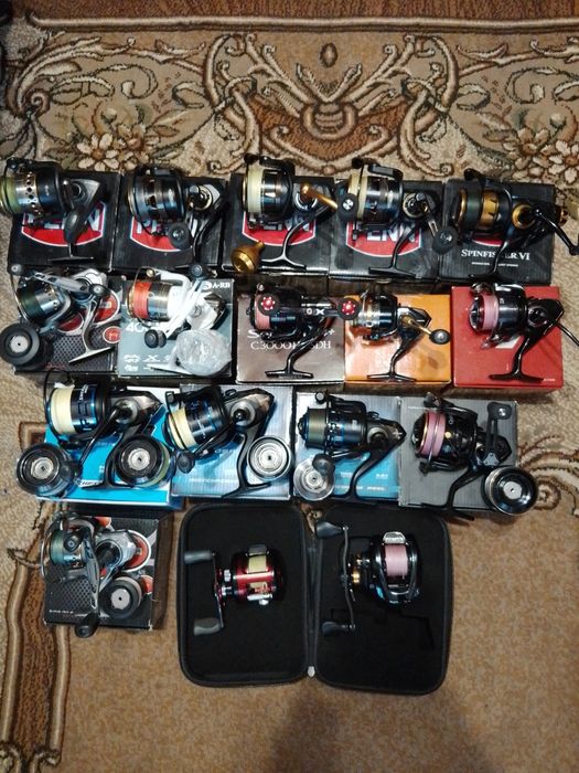 Спінінги катушки воблери човен мотор