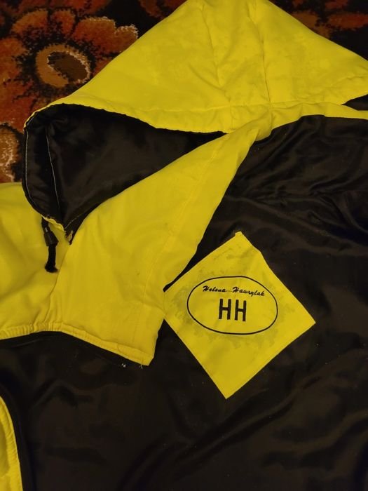 Duża męska kurtka jak robocza w odblaskowym fluorescencyjnym kolorze