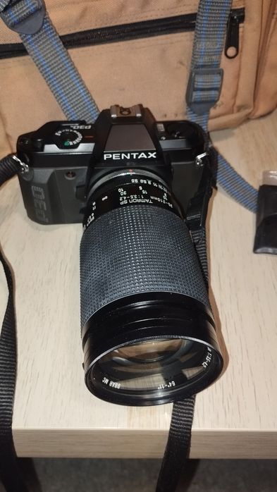 Câmera pentax com flash, lentes e mala (vendo peças à parte se interessado)