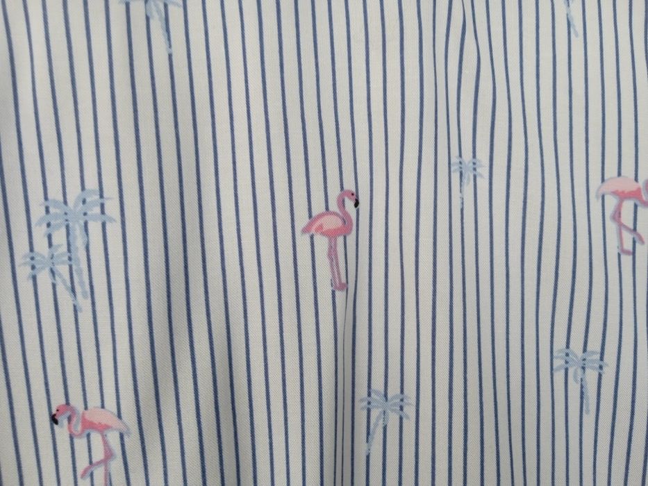 Koszulka bez rękawów z kołnierzykiem 34