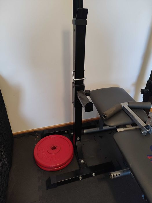 Suportes para barra e pesos de musculação