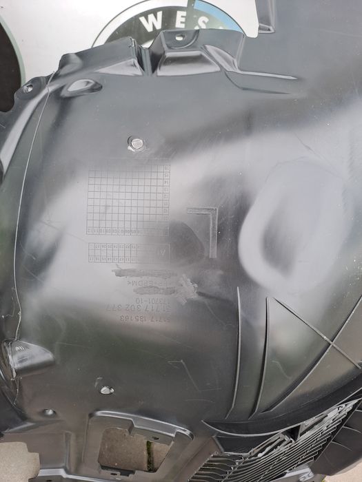 Підкрилок лівий передній бмв ф01 ф02