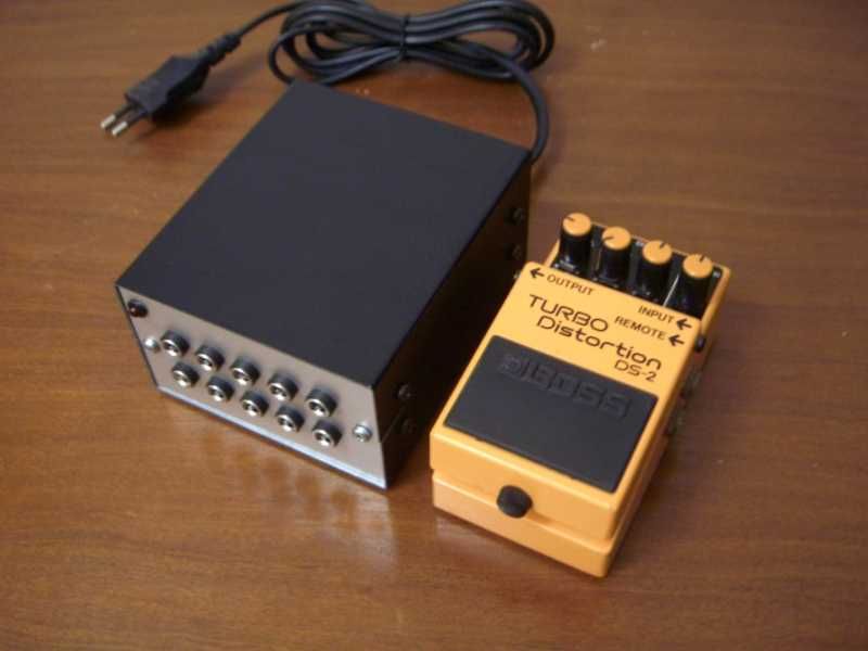 Power supply para pedais de guitarra e instrumentos musicais