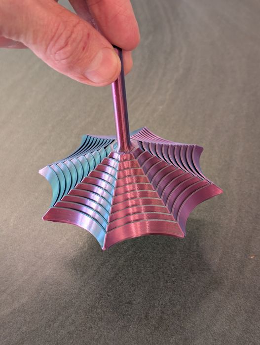 Brinquedo fidget teia de aranha
