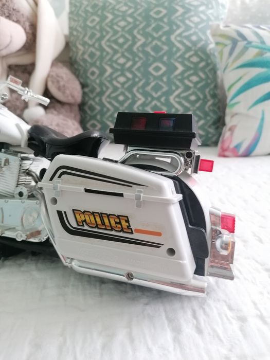 Brinquedo mota de polícia com som e luzes