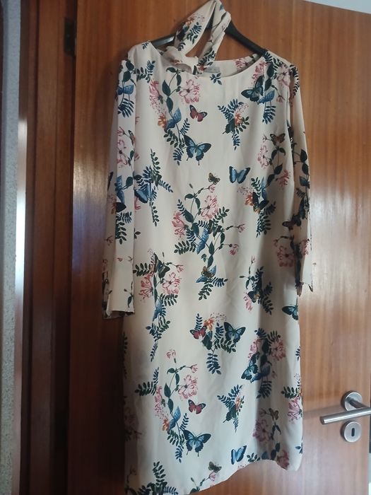 Vestido rosa com borboletas