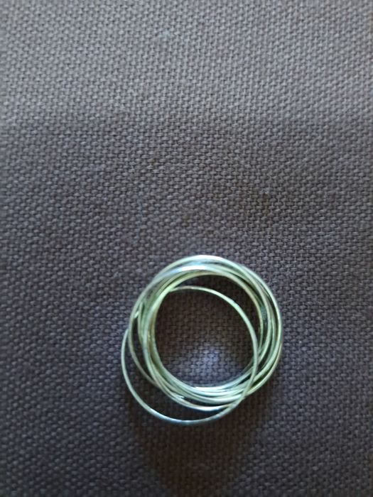 Anel com 7 alianças em prata